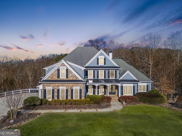 view of front of house featuring a yard