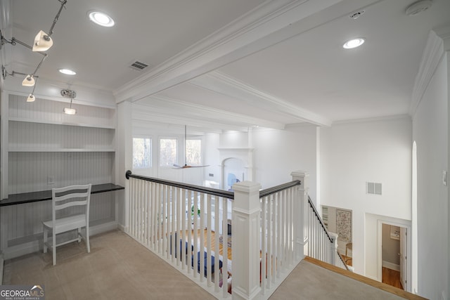 hallway with beamed ceiling and ornamental molding