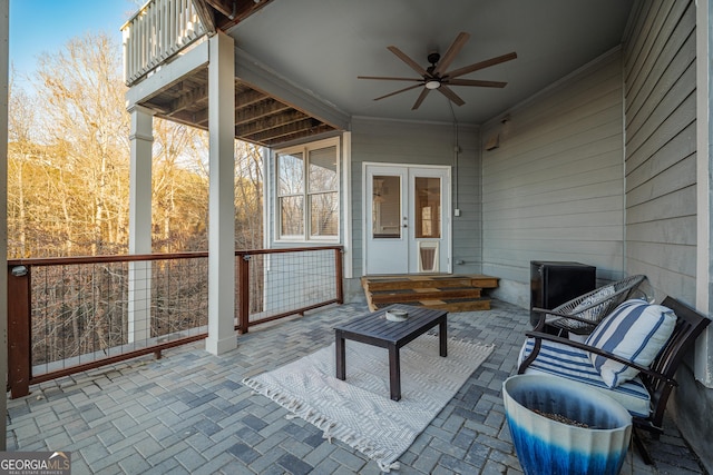 exterior space featuring french doors and ceiling fan