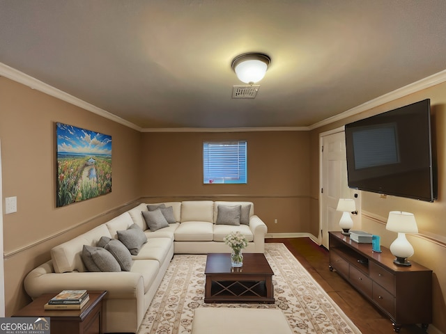 living room featuring crown molding