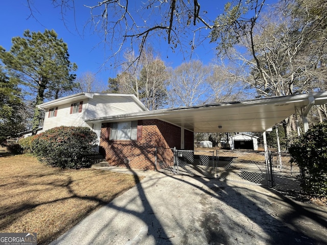 view of side of home featuring a carport