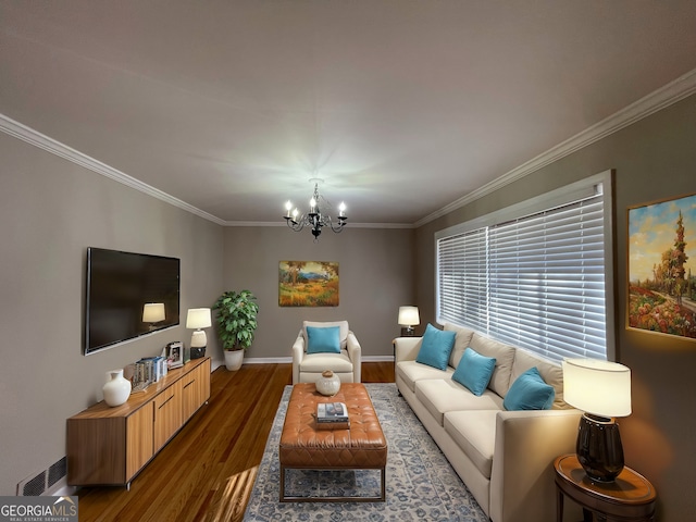 living room with an inviting chandelier, ornamental molding, and dark hardwood / wood-style floors