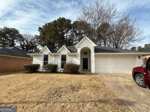 ranch-style house with a garage