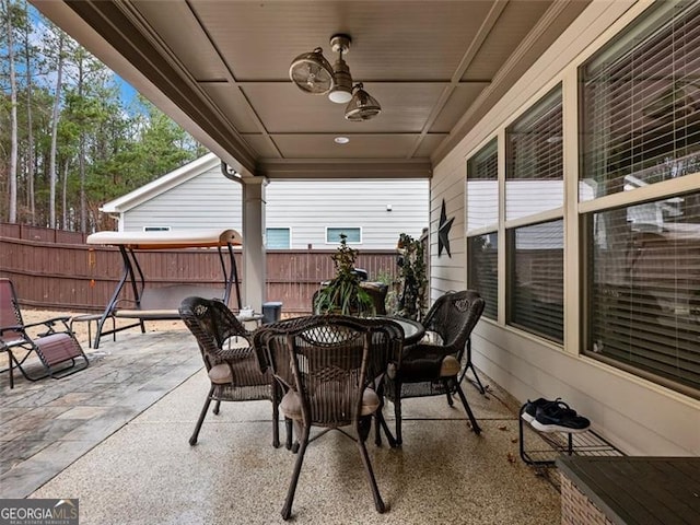 view of patio featuring ceiling fan