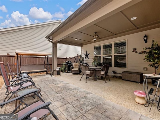 view of patio with a grill