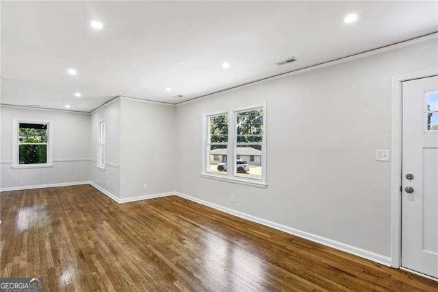 interior space featuring plenty of natural light and wood-type flooring