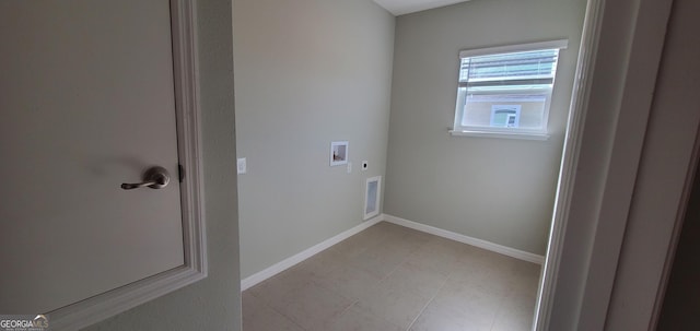 clothes washing area featuring electric dryer hookup and washer hookup