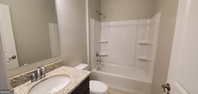 full bathroom with bathing tub / shower combination, vanity, and toilet