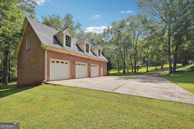 view of property exterior with a garage and a lawn