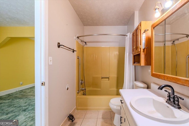 full bathroom with tile patterned flooring, vanity, a textured ceiling, shower / washtub combination, and toilet