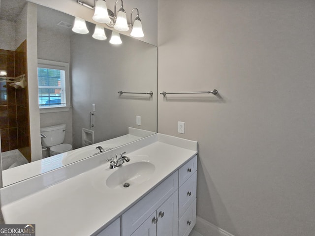 bathroom with vanity and toilet