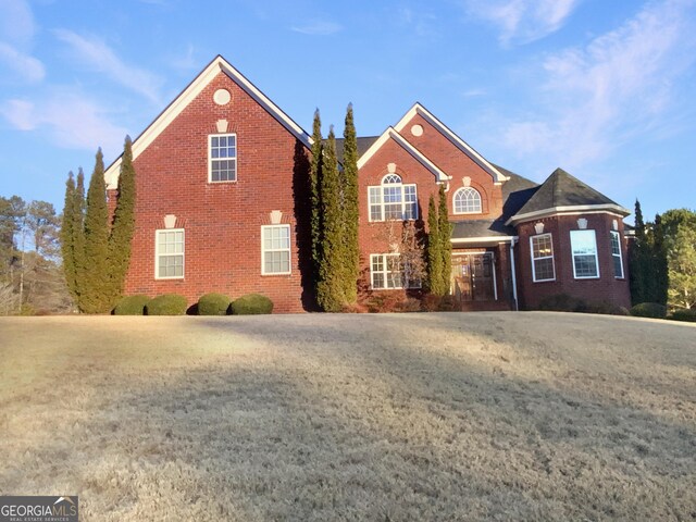 front of property featuring a front yard