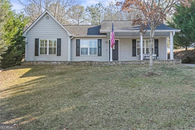 single story home featuring a front yard and covered porch