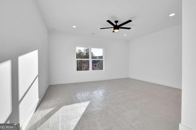 empty room featuring light carpet and ceiling fan