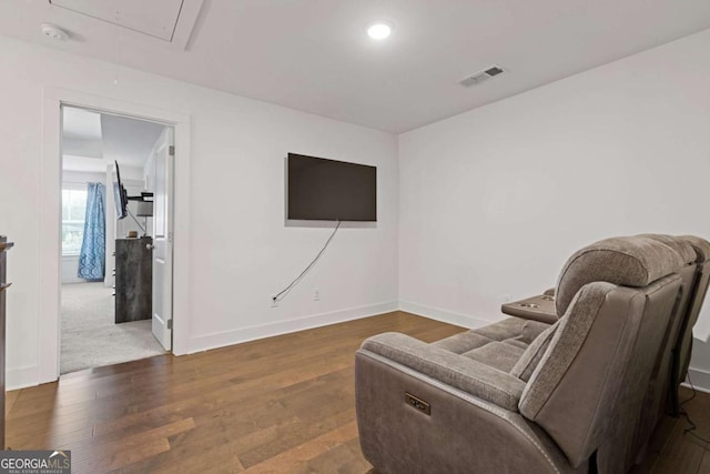 living area with dark wood-type flooring