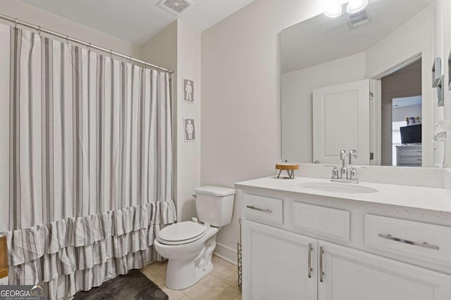 bathroom featuring walk in shower, tile patterned floors, toilet, and vanity