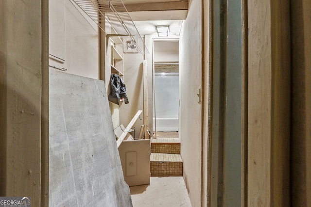 hallway featuring concrete flooring