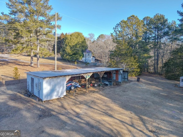 view of outdoor structure with a carport