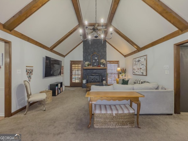 living room featuring a notable chandelier, light colored carpet, high vaulted ceiling, and a large fireplace