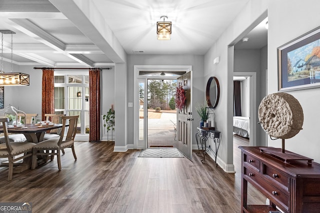 45 Misty Creek Cv, Newnan, GA 30265 - dining room featuring coffered ceiling, beamed ceiling, a chandelier, baseboards, and dark wood finished floors