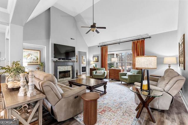 45 Misty Creek Cv, Newnan, GA 30265 - living room with wood finished floors, baseboards, and lofted ceiling