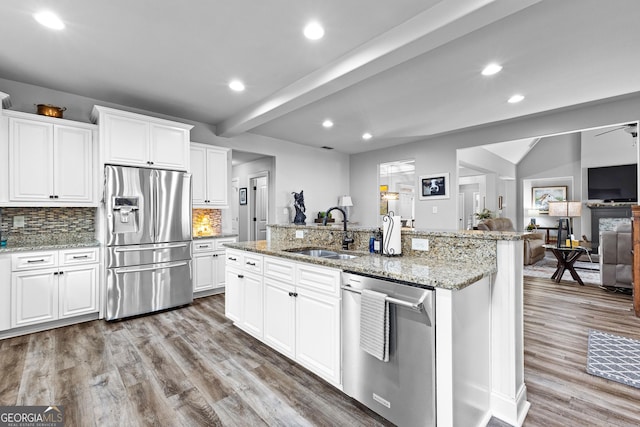 45 Misty Creek Cv, Newnan, GA 30265 - bedroom featuring high vaulted ceiling, dark wood finished floors, and baseboards