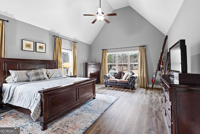45 Misty Creek Cv, Newnan, GA 30265 - bedroom with high vaulted ceiling, wood finished floors, baseboards, and ceiling fan