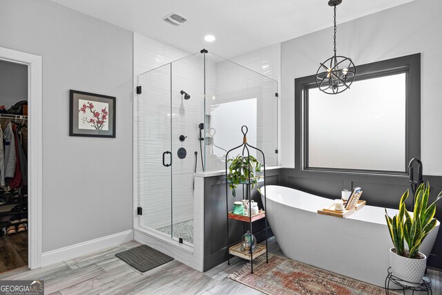 45 Misty Creek Cv, Newnan, GA 30265 - spacious closet featuring wood finished floors