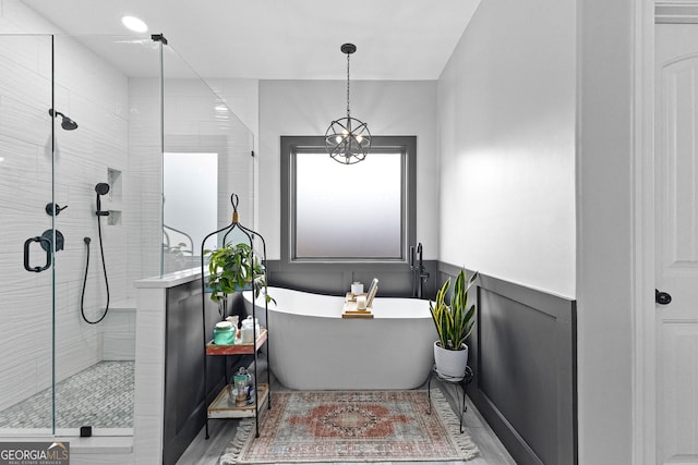 45 Misty Creek Cv, Newnan, GA 30265 - bathroom with a stall shower and a soaking tub