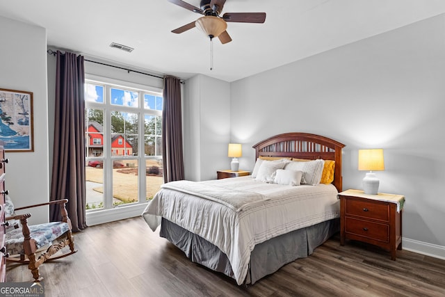 45 Misty Creek Cv, Newnan, GA 30265 - bathroom featuring toilet, wood finished floors, shower / bath combo with shower curtain, and vanity