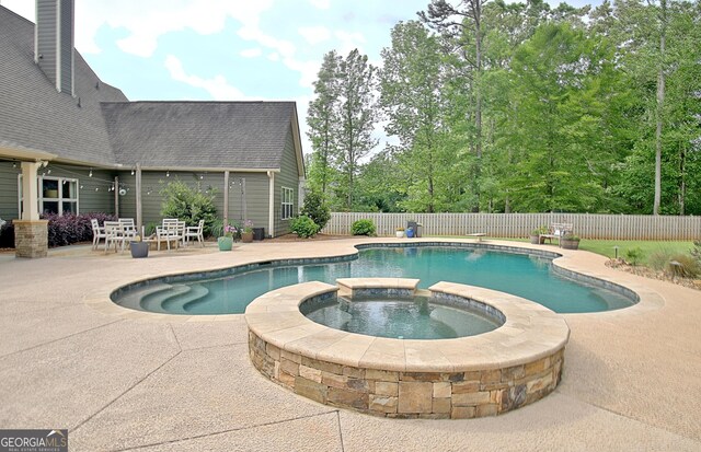 45 Misty Creek Cv, Newnan, GA 30265 - view of front of house featuring board and batten siding, driveway, and a garage