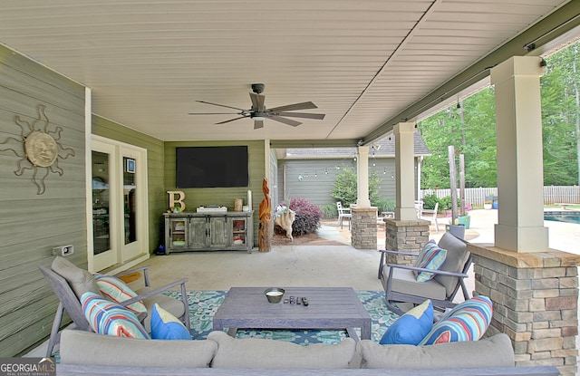 45 Misty Creek Cv, Newnan, GA 30265 - view of swimming pool with a patio, a pool with connected hot tub, and view of wooded area