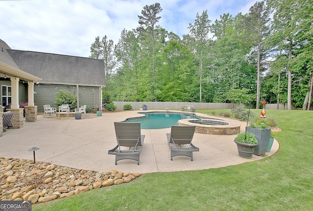 45 Misty Creek Cv, Newnan, GA 30265 - view of pool with a patio area, a fenced backyard, and a pool with connected hot tub