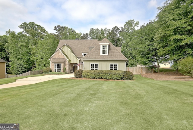 45 Misty Creek Cv, Newnan, GA 30265 - view of yard with a patio area, view of scattered trees, an outdoor living space with a fire pit, and a ceiling fan