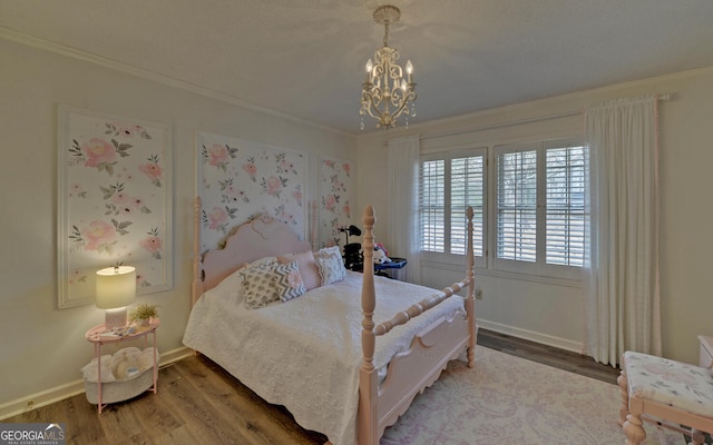 bedroom featuring wood-type flooring, a chandelier, and crown molding