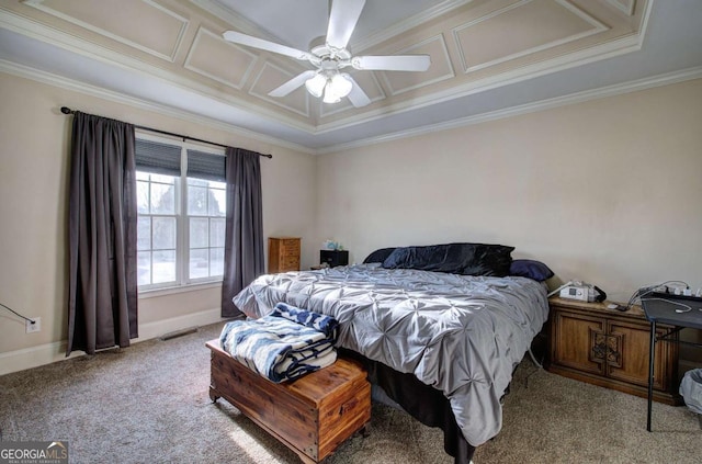 carpeted bedroom featuring ornamental molding, a raised ceiling, and ceiling fan