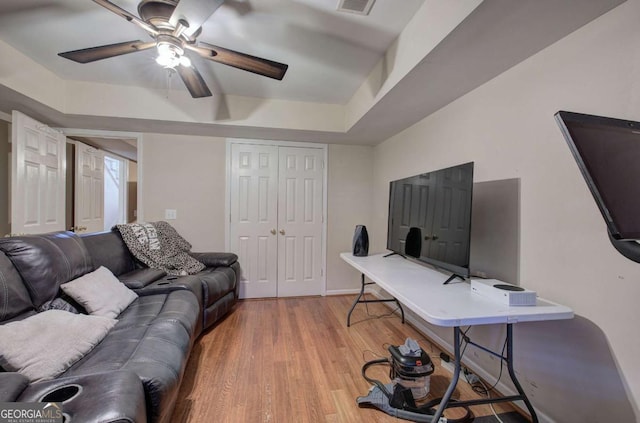 office featuring hardwood / wood-style flooring and ceiling fan