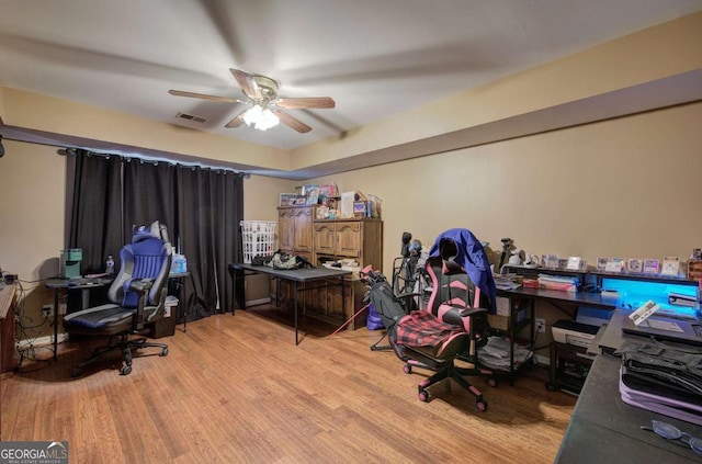 office featuring ceiling fan and light hardwood / wood-style floors