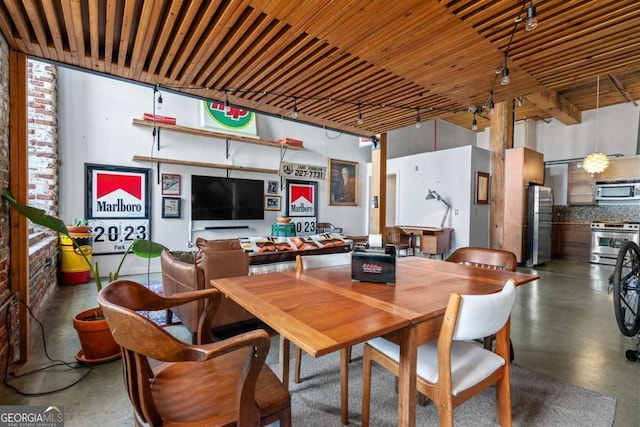 dining room with concrete floors