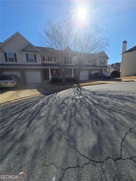 view of front of property featuring a garage