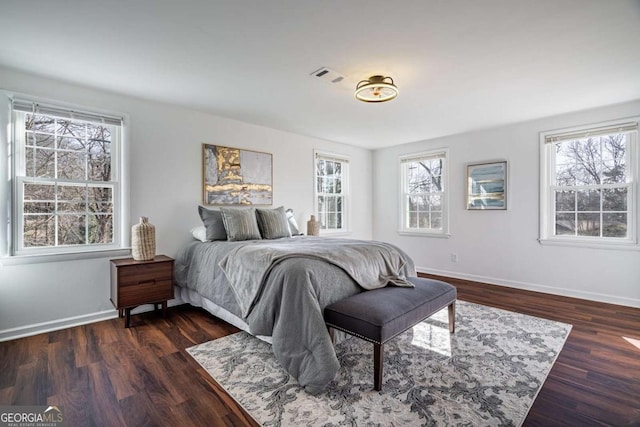 bedroom featuring dark hardwood / wood-style floors