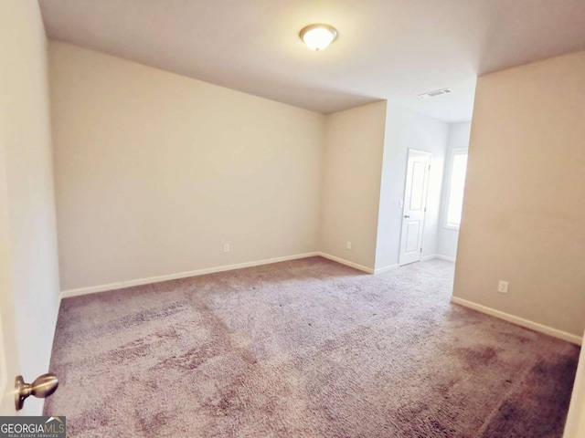 empty room with carpet floors