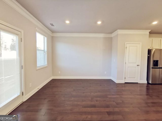 interior space with crown molding and dark wood-type flooring