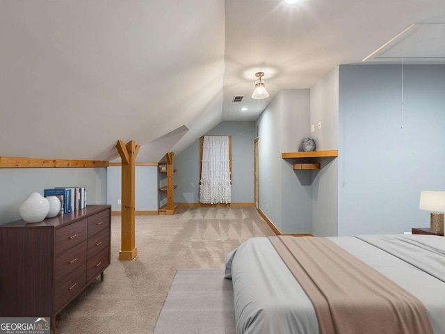 carpeted bedroom featuring vaulted ceiling