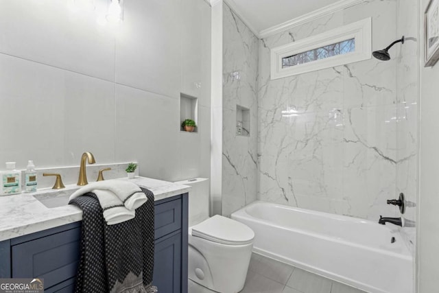 full bathroom featuring crown molding, vanity, toilet, and tub / shower combination