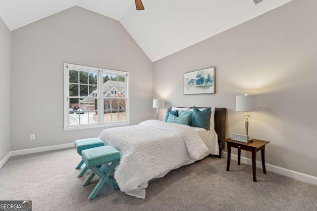 carpeted bedroom with ceiling fan and lofted ceiling