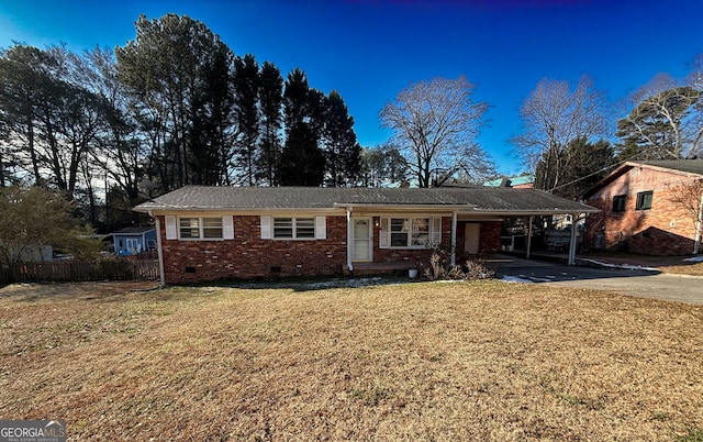 single story home featuring a carport and a front lawn