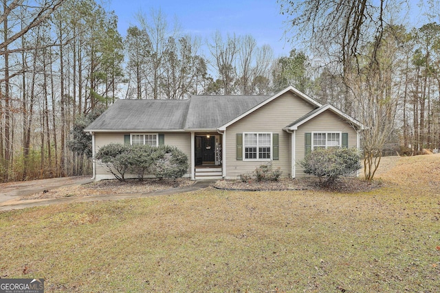 view of front of home with a front lawn