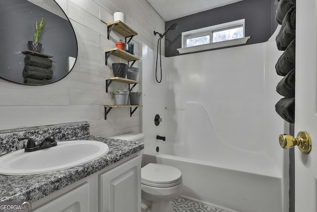 full bathroom featuring vanity, decorative backsplash, bathing tub / shower combination, and toilet