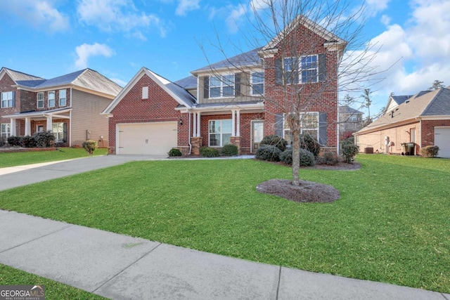 view of front of home featuring a garage and a front lawn